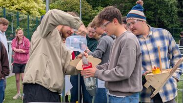 Mechanical Engineering students preparing their water bottle rocket
