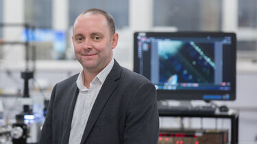 Professor Dan Gladwin stood facing forward