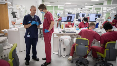 A tutor and student talking in the CSLE