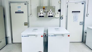 The control panel and doors into the two controlled temperature rooms in the fly facility.