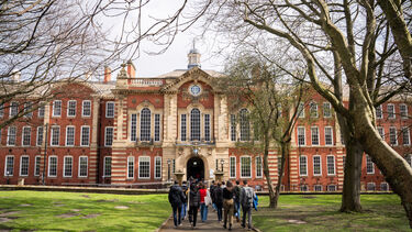 A group of engineering applicants on a tour of the campus, heading towards the Mappin Building