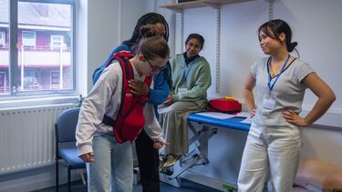 Image showing students using a choking vest