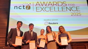 Five students stand in front of a screen which reads "NCTJ awards for Excellence"
