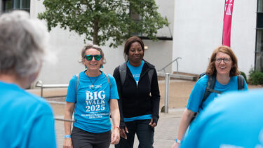 A group of walkers crossing the finish line