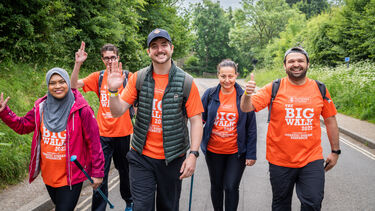 A group of walkers smiling