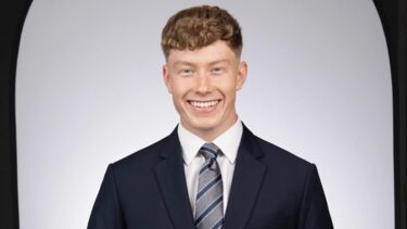 Student Ethan Gell wearing a suit