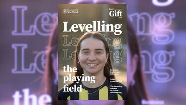 Magazine cover featuring a smiling young woman with long dark hair wearing a black and gold football top over the text "Levelling the playing field"