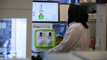 A researcher doing an experiment 
