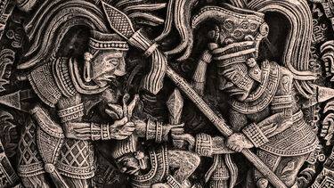 Copy of bas-relief with representing aztecs - ancient militant mexican tribe