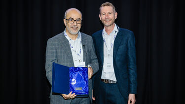 Prof Mimoun Azzouz receiving his BSGCT award
