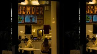 Photographic shot of cafe and Sonder name