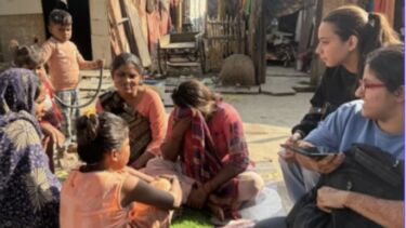 Mansi and Hiya sitting with a group of women shy-ly talking about their husband’s jobs Source - Original pictures from dissertation fieldwork (November 26, 2026)