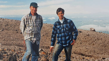 John McArthur (left) and colleague on Mount Taranaki, New Zealand