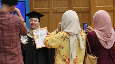 Management students celebrating graduation 2026