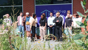 Group of founders outside studio