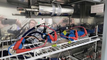 Testing inside a reflective environmental chamber