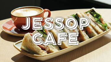 Jessop Cafe logo over a coffee and a club sandwich 