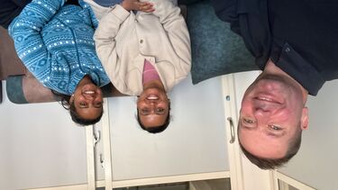 Three people sat together