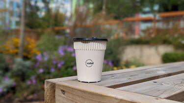 A Vytal cup in a park