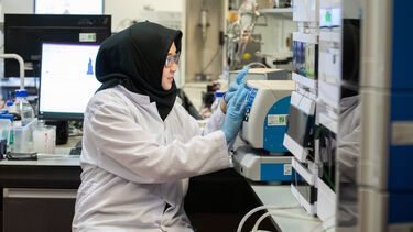 A researcher at work in the lab 