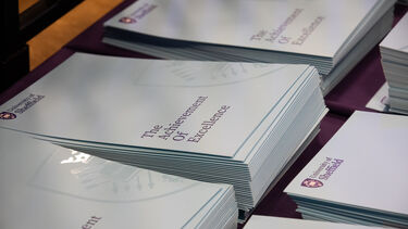 certificate folders in graduation hall