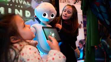 Children interacting with a robot at Festival of the Mind