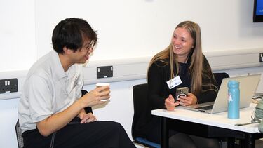 Two engineers engaging in conversation