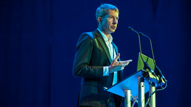 Engineering expert presenting on a stage