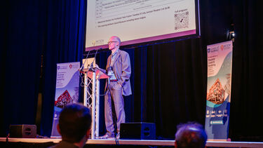 Engineering expert presenting on a stage