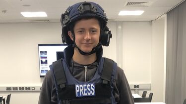 Student in press outfit