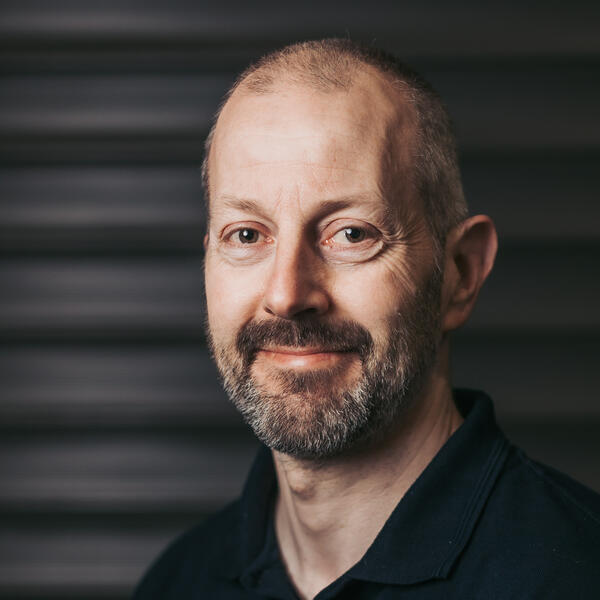 Profile picture of A head and shoulders photo of Adrian Sharman