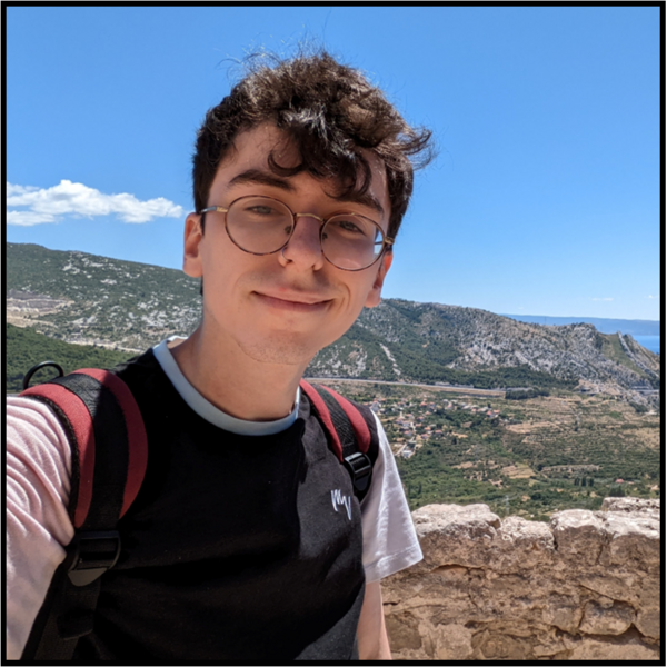 Profile picture of Ben Cornford outside on a hill