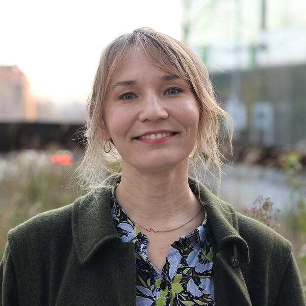 Profile picture of Irina smiling in the garden outside jessop west