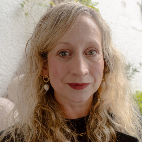 Profile picture of Headshot of Jess Bradley, stood outside 