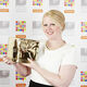 PGDE award winner Lorna holds her trophy - image