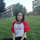 Baoli sitting on the grass in front of the University accommodation