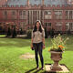 Bhadra standing on the grass in the sunny court yard at Firth Court