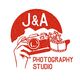 J and A Photography studio logo with red camera and graphics 