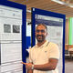 MMet Student Naser in front of his poster presentation