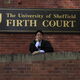 Hao MSc graduate in front of Firth court 