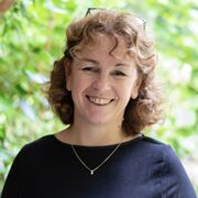 A profile photograph of Emma Heywood. 