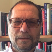A profile photograph of Professor Ralph Negrine