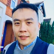 A head and shoulders photograph of Yichuan Wang.