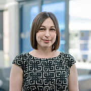 Karen Niven wearing a black and white patterned top.