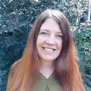  Liz Chesworth in the garden, smiling 