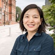 Dr Tehyun Ma outside, the Jessop Building in the background