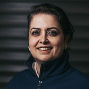 A head and shoulders photo of Evren Yasa