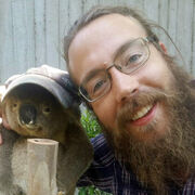 Image of Dr. Thomas Guillerme with a koala in a hat