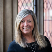 Portrait of a person smiling with straight long hair