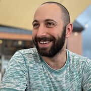 Image of Dr Ariel Frame, a bearded man wearing a blue camouflage shirt
